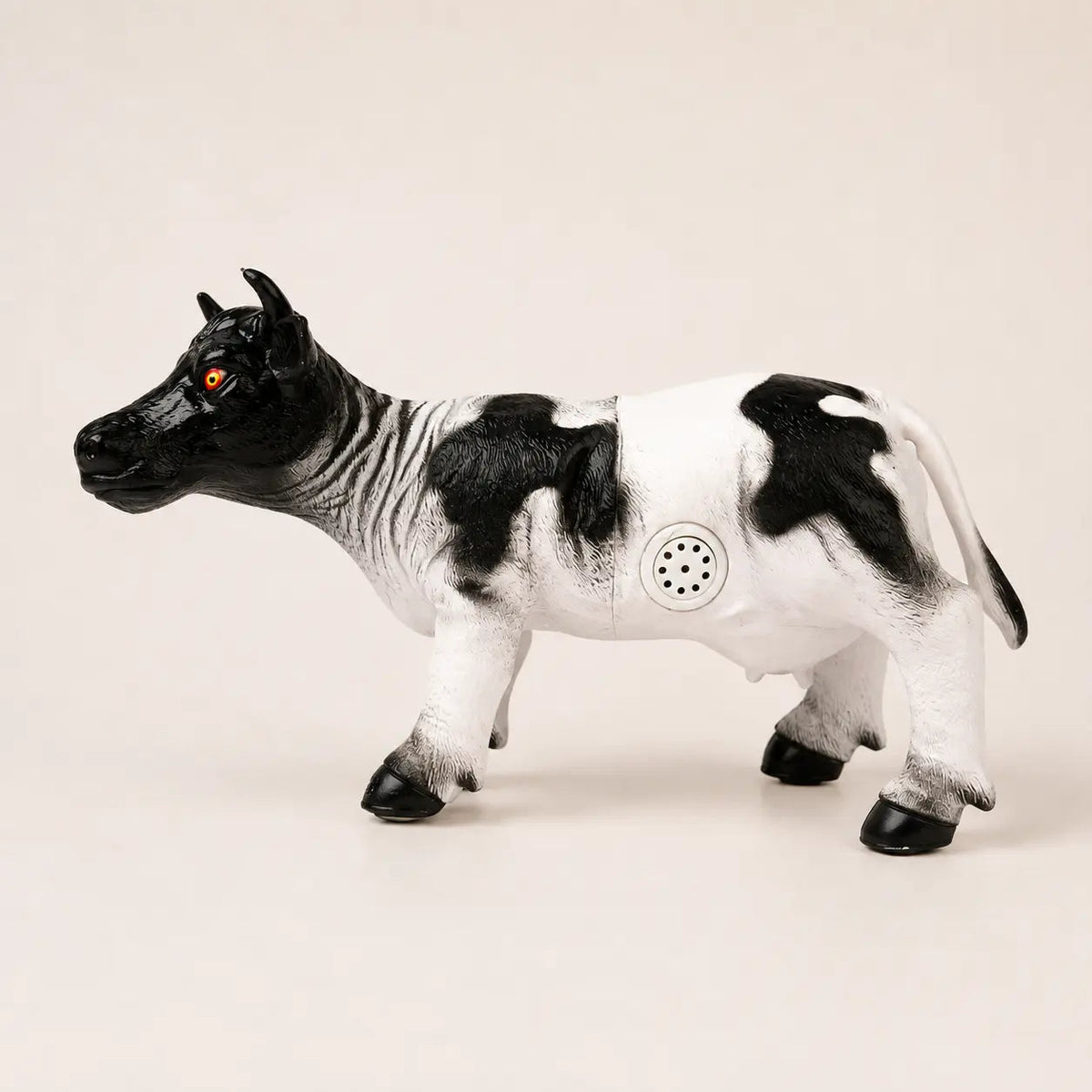 Black and white cow toy figure for farm play