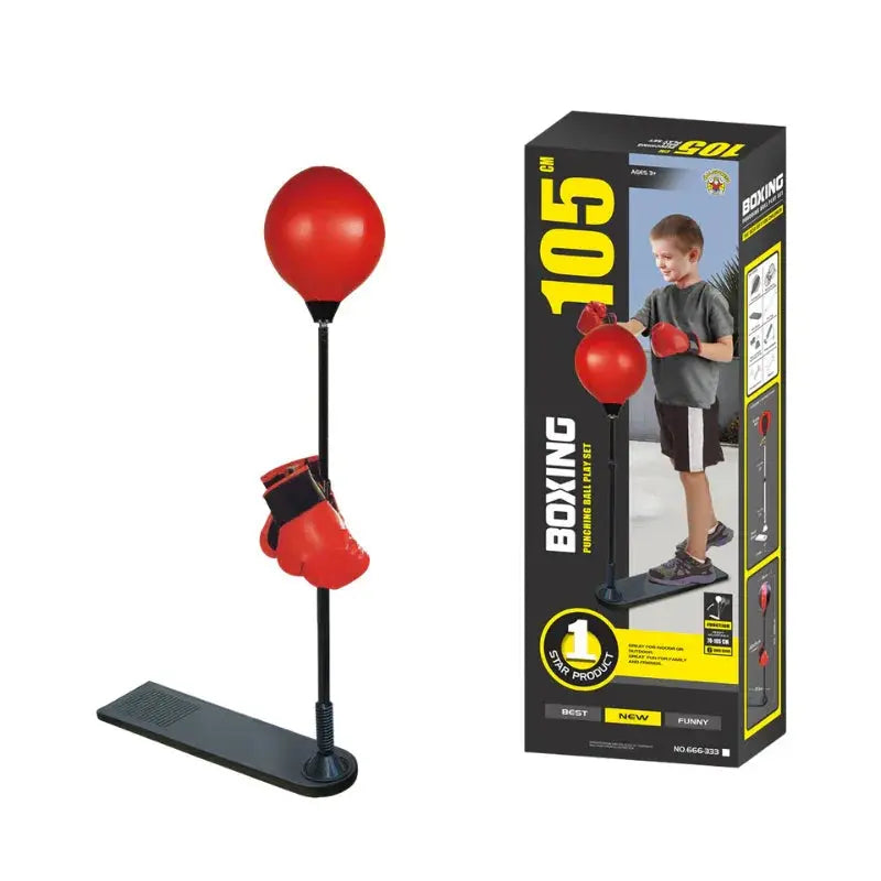 Boxing training setup with red punching ball, gloves, and stand next to its packaging.