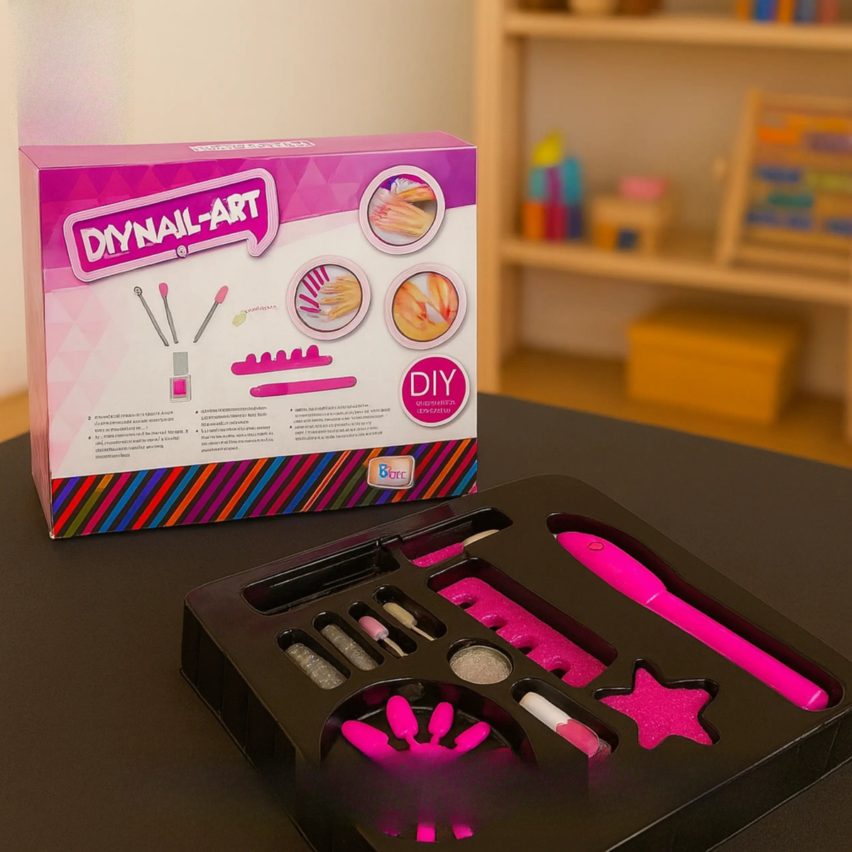 Good Baby DIY nail art kit with tools and colors on a table, branded packaging in the background.