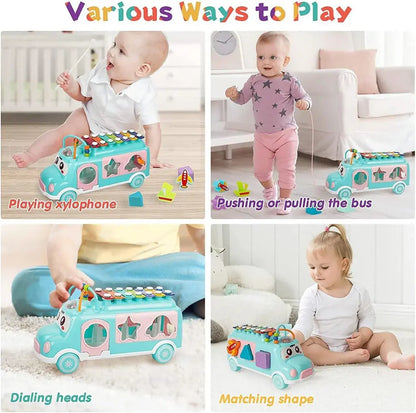 "Toddler playing musical xylophone toy on multifunctional school bus – promotes music and fine motor skills"