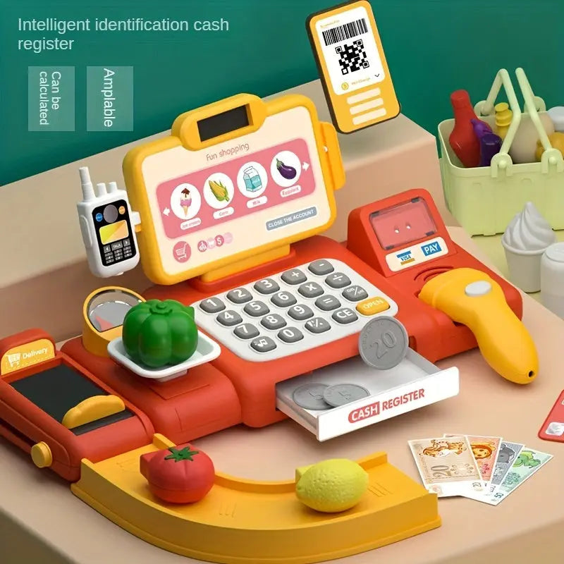 Toy cash register with digital screen and various accessories on a table.