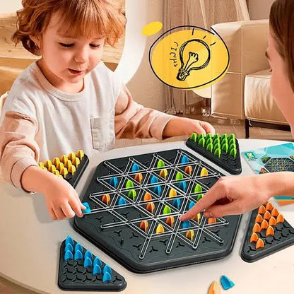 Two children playing with a colorful puzzle game on a table.