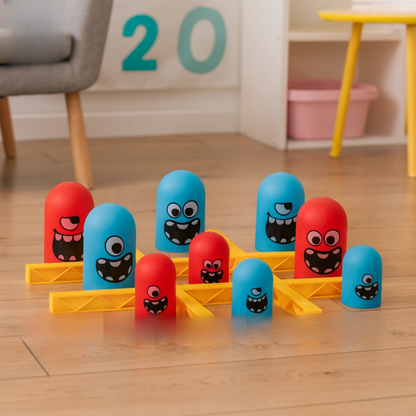 Colorful toy bowling set with red and blue pins on a wooden floor, featuring 'Good Baby' branding.