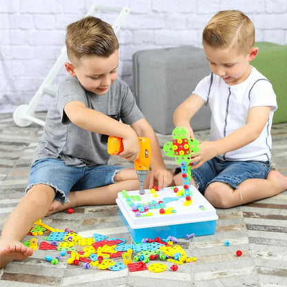 Two children playing with a colorful building block set on a wooden floor.