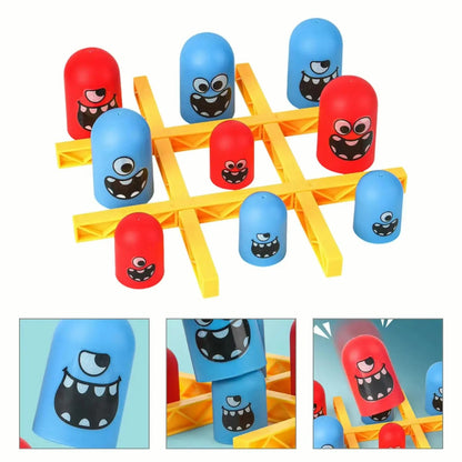 Toy structure with red and blue cylindrical pieces featuring monster faces on a white background.